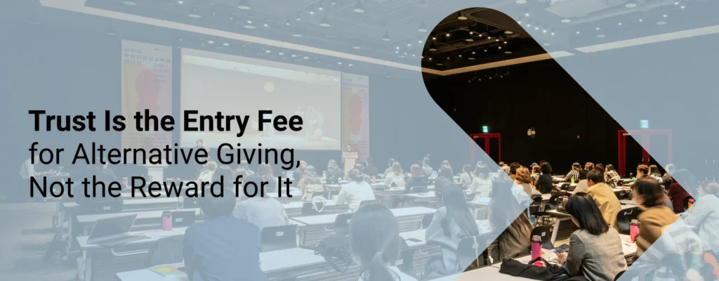 A marketing conference about nonprofit marketing with overlay text that says, “Trust Is the Entry Fee for Alternative Giving, Not the Reward for It