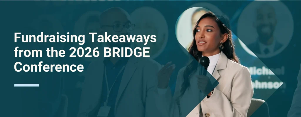 A marketing professional raising a question during a conference panel with overlay text that says, “Fundraising Takeaways from the 2026 BRIDGE Conference"