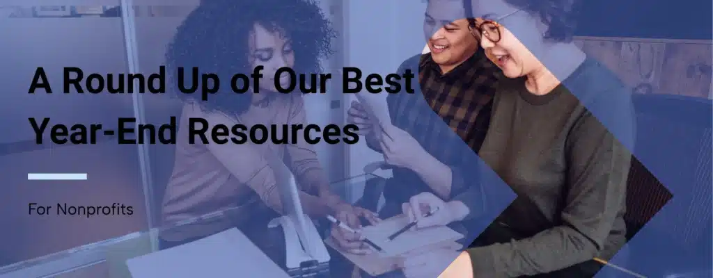 A group of people discussing year-edn resources for a nonprofit with overlay text that reads, “A Round Up of Our Best Year-End Resources for Nonprofits