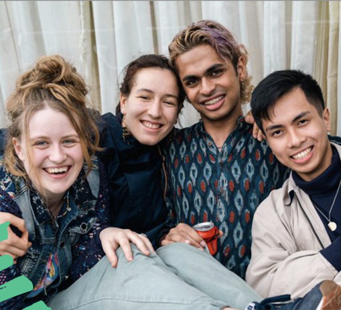 GCY image of four students smiling together