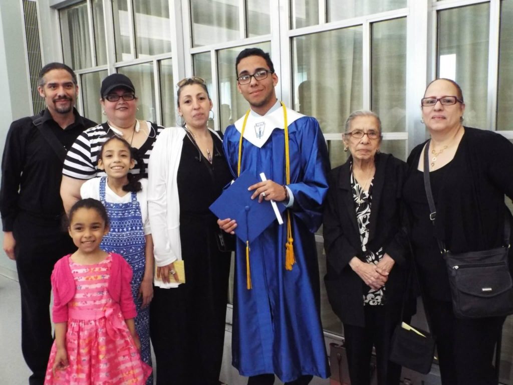 Joe with family at graduation