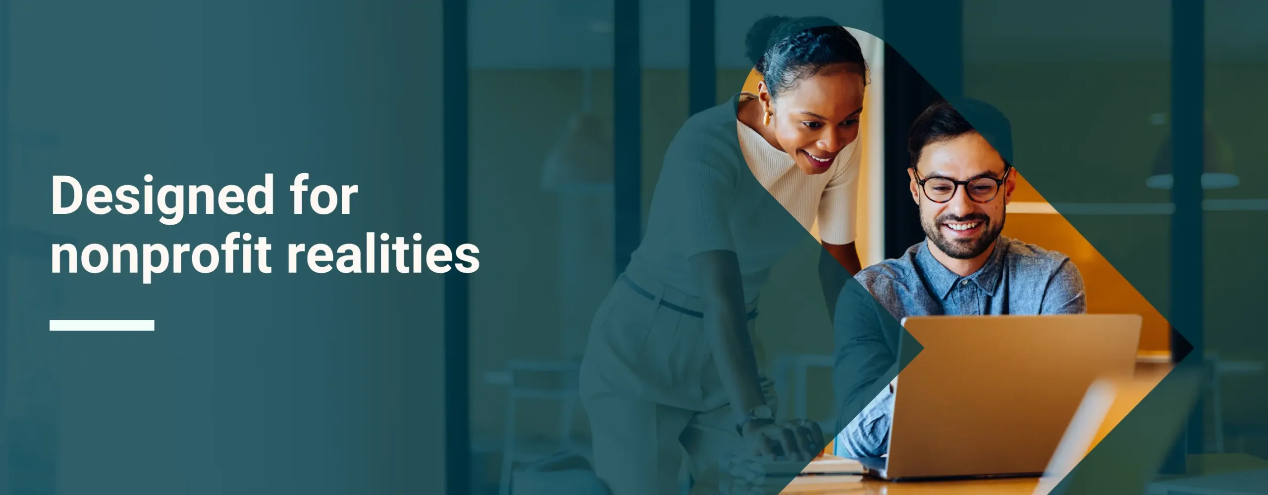 Two nonprofit professionals researching RallyBot with overlay text that reads “Designed for nonprofit realities”