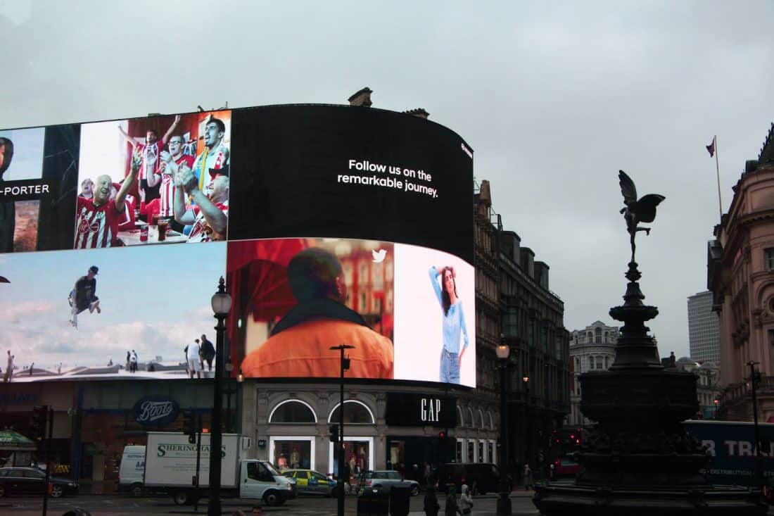 digital advertising Billboard outside on busy street