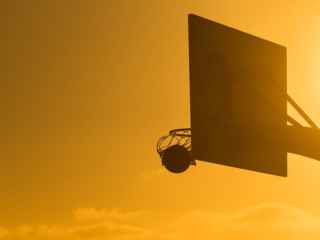 sunset with basketball hoop