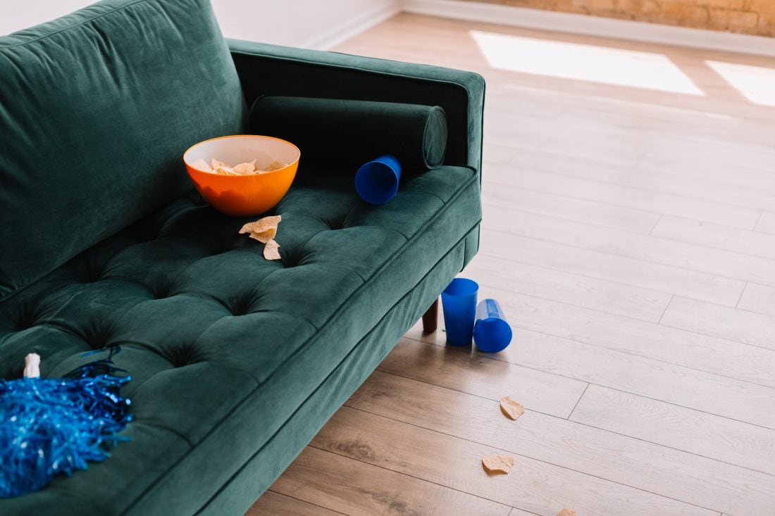 couch with chips and cups all over it