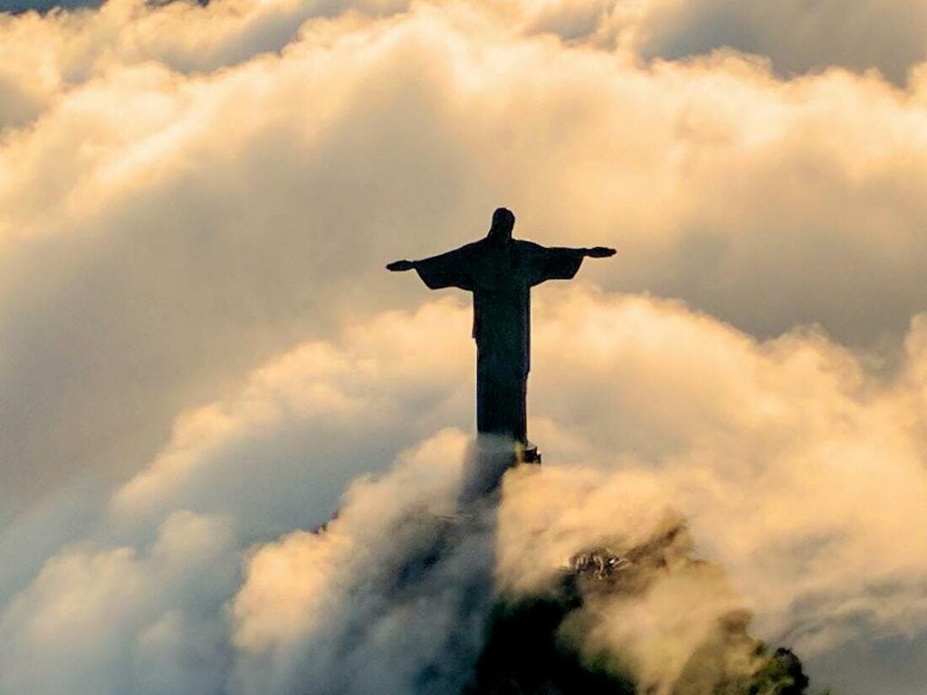 christ redeemer statue in clouds