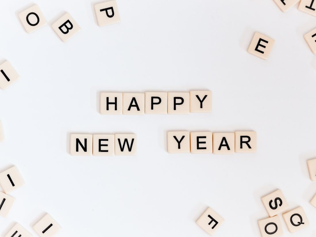 Happy New Year spelled out in scrabble letters